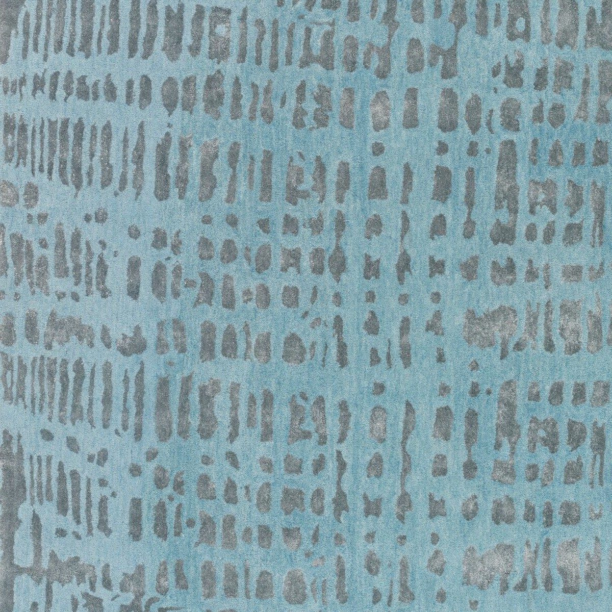 JOOP! Croco Teppich mit Muster in Blau in Detailansicht.